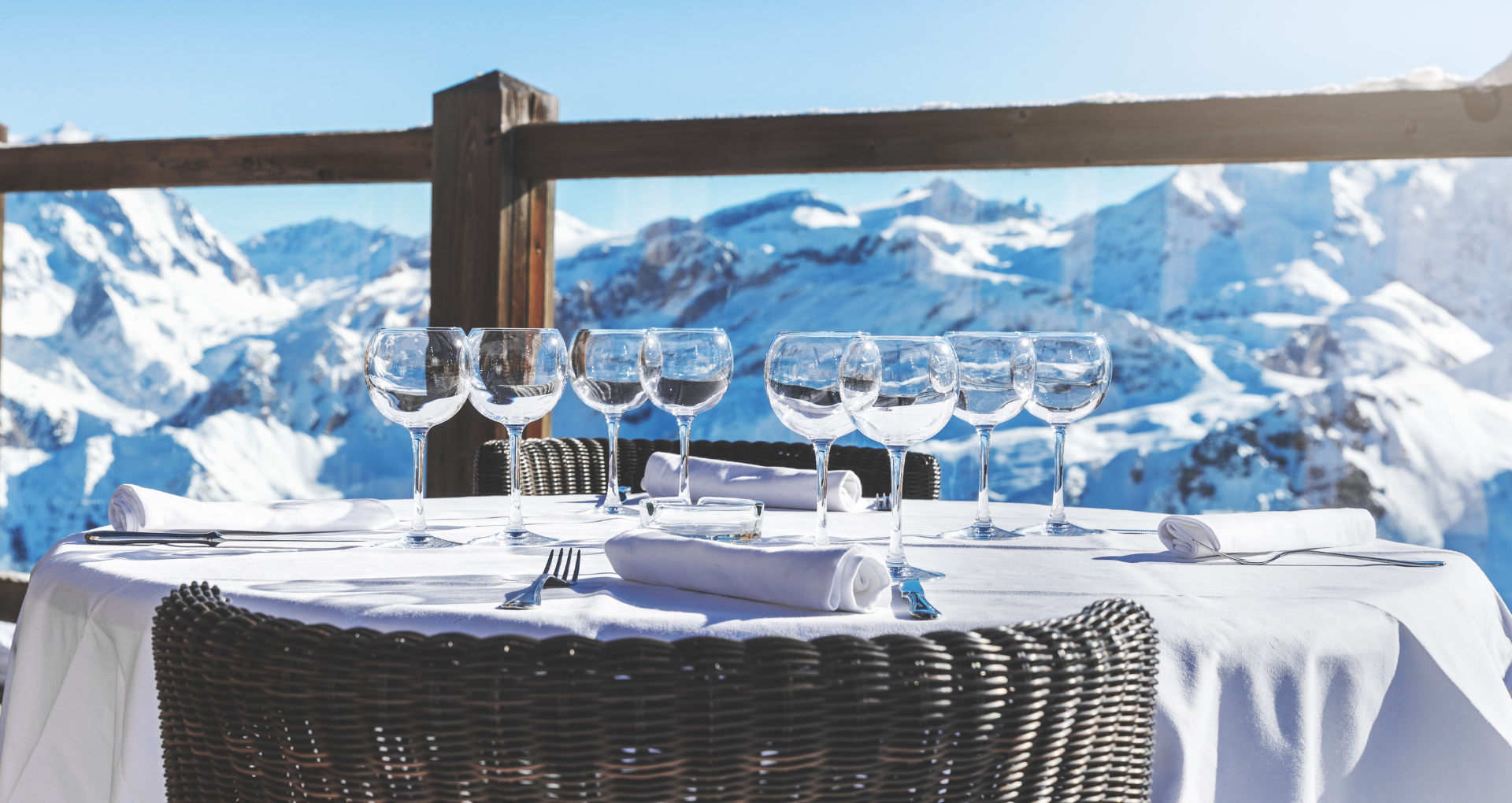 A set dinner table with wine for a relaxed All-inclusive ski holiday booked at Sunweb